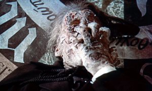 Dracula (Christopher Lee) peels away his burning flesh in the restored ending to HORROR OF DRACULA (1958)