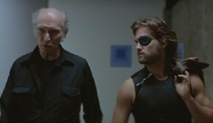 Lee Van Cleef gives Kurt Russell all he can handle in ESCAPE FROM NEW YORK.